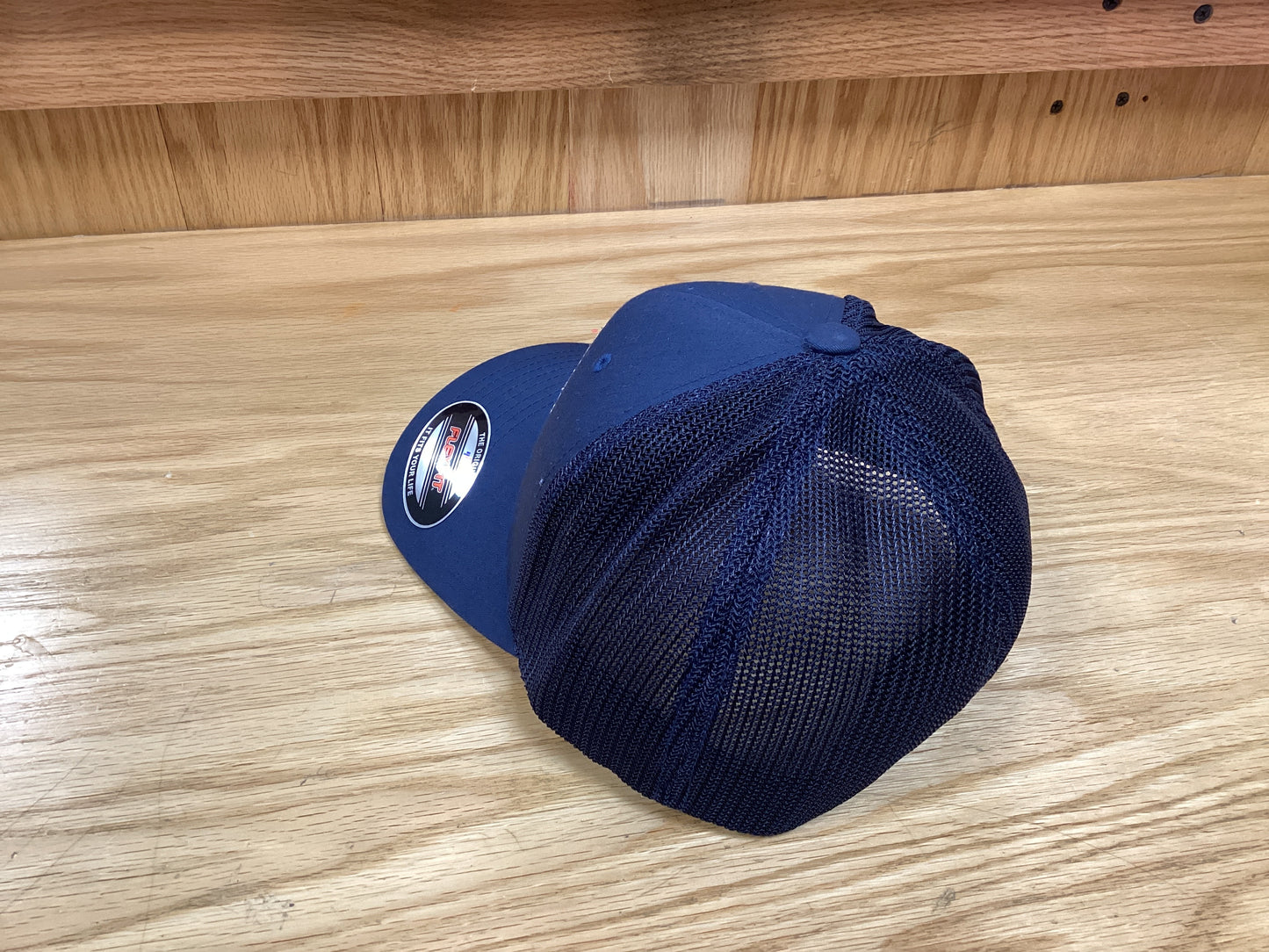 Fitted Navy BP trucker cap